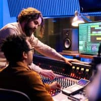 skilled-artist-working-with-audio-technician-edit-recorded-songs_482257-84400-r2sz374s4mtyba0qv62ujio7ryc65i49uhc7avd9sg skilled-artist-working-with-audio-technician-edit-recorded-songs_482257-84400-r2sz374s4mtyba0qv62ujio7ryc65i49uhc7avd9sg